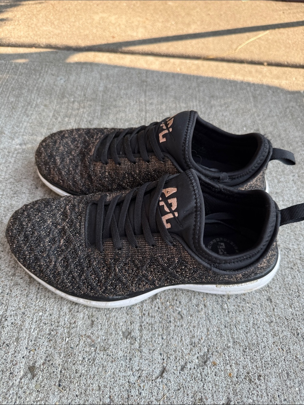 APL Women's Black Knit Lace-Up Sneakers with Subtle Rose Logo